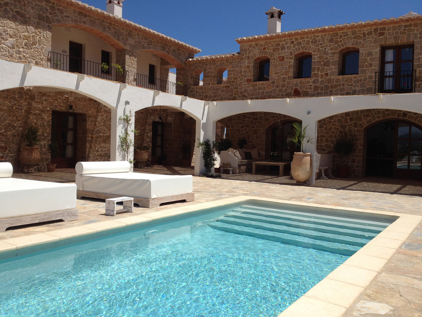 Pool and mountain views for retreat downtime at Cuatre Finques