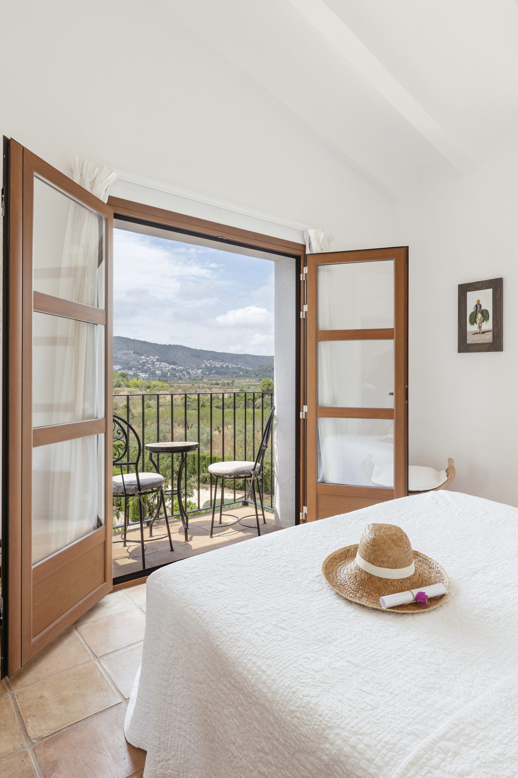 Bedroom balcony with valley view at Cuatre Finques