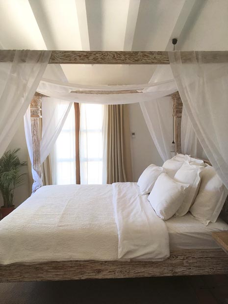 Room with canopy bed, alternate view, at Cuatre Finques